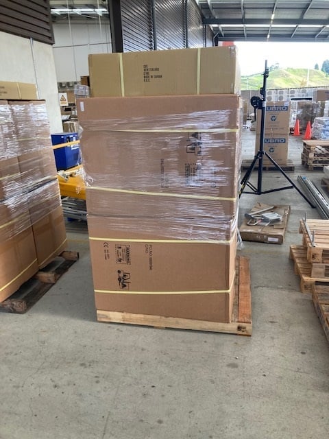 Boxes containing furniture bound for Kiribati